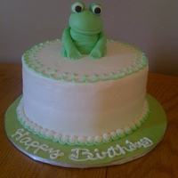 Frog Cake My first fondant figure.....it was for my mom ( she LOVES frogs). The cake is pink champagne with buttercream icing