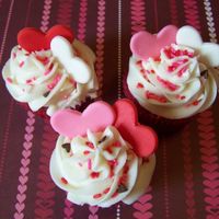 Valentine Cupcakes These are red velvet with cream cheese icing. I saw the sprinkles in the store and just had to have them....add some fondant hearts and...