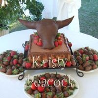 Jeremy's Grooms Cake This was made for a guy who loves roping... and strawberries. It was actually a cookie cake because the groom doesn't like cake.