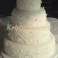 Randee This is based on a cake from confetti cakes. This is the back. The lighting's not great, but I loved this cake.