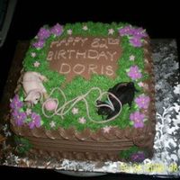 Cats 82nd birthday cake chocolate fudge with chocolate mousse, and chocolate buttercream. cats are made of fondant as well as yarn