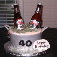 Coors Beer Bottle Cake Make this cake for my husband 40th b-day. Big thanks to Amy for her tutorial. My husband and friends were amazed. This is my first beer...