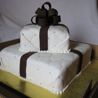 Present Wedding Cake 2 tier, first time doing a bow, it was actually pretty easy, although attaching all those gold dragees was a bit time consuming