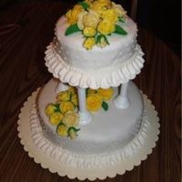 Weddingcake1.jpg This was my "Grande Finale" cake during the Wilton Classes. I worked forever on those roses - I LOVE how they turned out!