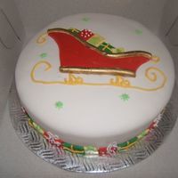 Sleigh Full Of Presents Fondant covered cake with royal icing and fondant presents