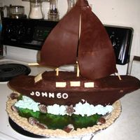 Chocolate Sail Boat I made a spiced chocolate tort in two heart shaped pans. I cut the heart sin half and then frosted the two halves together with espresso/...