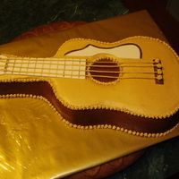 Guitar Cake Carrot cake with buttercream icing.