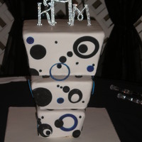 Square Wedding Cake wow this was a pain so glad it didn't fall over before i left. bottom tier is marble with butter cream middle is chocolate with white...