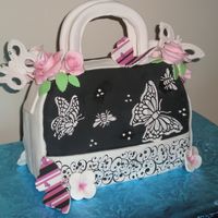 Miracles Butterfly Cake this is the 2nd cake the other one fell apart. wanted to try stenciling and image transfers and im sure i will do it again. butterflies are...