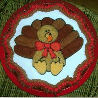 Turkey Cupcake Cake Did this for a really good friend for Thanksgiving. Not sure where I found the little turkey but loved him and decided to do him on a...