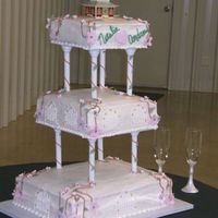 Wedding Cake This is the third wedding cake that I have made. I actually think I did pretty well on this one. I guess third time is a charm. lol
