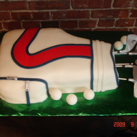 Golf Bag Fondant golf bag w/gumpaste golf clubs. White chocolate golf balls.