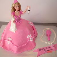 Barbie Sweet 16 Cake Sweet 16 who wanted a princess/barbie cake, holding a sugarpaste car key.