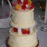 Karen's Bridal Shower IMBC frosting, Bottom is Chocolate Khulua cake, top is white almond sour cream cake. Both filled with raspberry filling. Gumpaste roses and...
