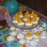 First Birthday Cupcakes - Rubber Duckies My son's first bday...LOVES the rubber duckies! Light blue whipping cream frosting, meringue bubbles