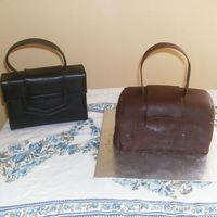 First Purse Cake Thanks to all for the insipration. It turned out ok. Cousin like it, that's all that matters. Definitely need more practice though....