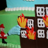 Fireman Fireman on fire truck cake for my sons 2nd birthday