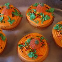 Autum Cupcakes Just made these up... french vanilla cupcakes,butter cream icing and candy pumpkin on top :)