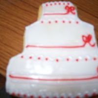 First Time Doing A Wedding Cake Cookie A lady wants me to make 150 wedding shaped cookies for her wedding in march.. what do you think?.. this is a practice cookie.