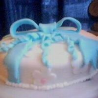 First Fondant Cake (Wilton Course 3) This is the first time i've coverd a whole cake in fondant, i love the look of the fondant.. but could do away with the taste *bleh*