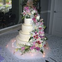 Tina This was the cake I did for this past weekend. It is white cake with butter pecan mousse filling and chocolate cake with german choc...