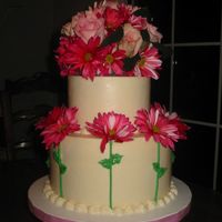 Roses And Daisies I found this design on this site and I loved it! I was given free reign over this cake design, so here it is! It was for a wedding shower...