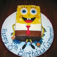 Spongebob Squarepants I did this cake for a little girl that is frilly, but loves Spongebob also! I decided to add some flowers and gummy hamburgers around him....