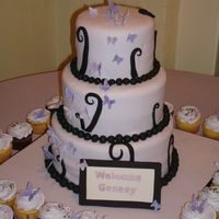 Purple Butterfly Cake This cake was for a baby shower. 12", 9" & 6" vanilla rum cakes covered in fondant. Gumpaste butterflies and fondant...