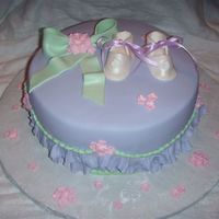 Baby Shower WASC cake with Satin Ice fondant ruffles and booties/bow