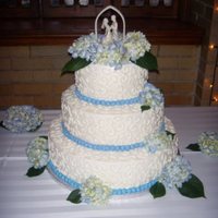 Hydrangea Wedding Cake WASC cake with raspberry filling and almond buttercream icing