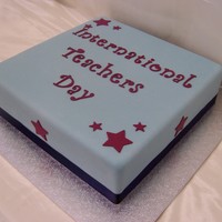 International Teachers Day 12 inch square mud cake covered in blue fondx - to match school colours to celebrate international teachers day