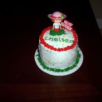 My First Decorated Cake I took my first wilton class today and I made this for my cousin. Its a marble cake with b/c icing. Strawberry shortcake is a toy. I am...