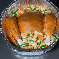 Turkey Cake Carrot cake with crusting cream cheese frosting, stuffing is white/pound cake combo and veggies are marzipan.