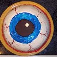 Eyeball Cake I made this cake for my duaghter's Mad Scientist Halloween party for school. It was a big hit! Yellow cake with strawberry filling....