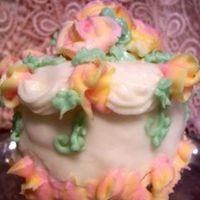 Tiny Rosebud Cake buttercream icing and roses on yellow cake for Mother's day