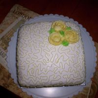 Yellow Rose Lemon cake with fondant, yellow roses and cornelli lace.
