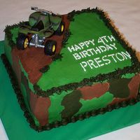 4-Wheeler Camouflage Cake This little boy loves all things camouflage and riding 4-wheelers, so that's what I gave him. 8" square cake.
