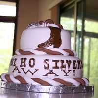 Hi Ho Silvers Away This cake is for a wedding shower. The bride is marrying a man with the last name Silver and apparently likes western gear. This cake was...
