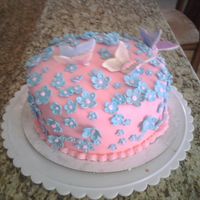 Spring Time Strawberry cake with Fresh strawberry filling, Pink Fondant and gum paste flowers and Butterflys.3rd Cake EVER!