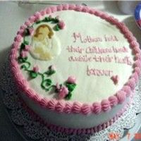 Mothers Day Cake bct on a vanilla cake with poem mothers hold their childrens hands awhile their hearts forever