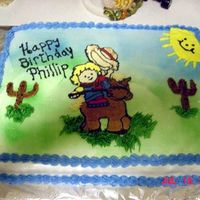 Cowpoke bct of cowpoke, on vanilla cake.