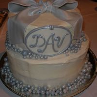 25 Th Anniversary Cake Made for my SIL and BIL 25th anniversary. Bottom tier is pina colada cake, top chocolate fudge - both filled and iced (very poorly) with...