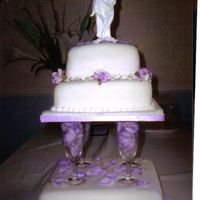 Wine Glass Cake My friend Jan made this cake for her son's wedding. i showed her how to cover them in fondant and dowel them. The top tier is victoria...