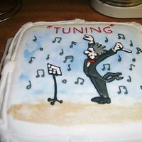 Dennis's Birthday Cake This cake was designed for the conductor of the band I play in. It was a complete surprise for him and I loved it. The cak is fruit cake...