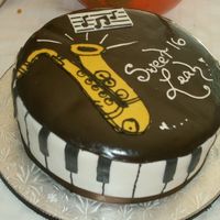 Piano Sax Cake i made this for my younger sisters birthday she plays the piano and the sax