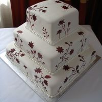 Wedding Cake Hand painted flowers on fondant icing.