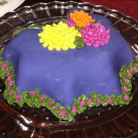 Little Fall Cake This is a chocolate chocolate chip cake with mmf and buttercream. I forgot to take a picture before we cut into it!