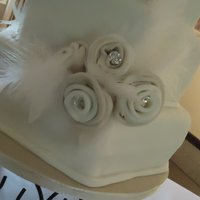 Textured Hexagon Cake 3 tier fondant hexagon cake. Fondant flowers matched the brides dress.