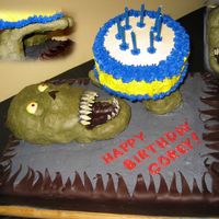 Zombie Cake Zombie cake that I made for my sons 8th birthday. I wanted it to look like the zombie was handing my son a cake. It is 2 9 X 13 marble...