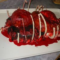 Carcus Cake this cake is made of buttercream and marshmallow fondant. The ribs are made of almond bark